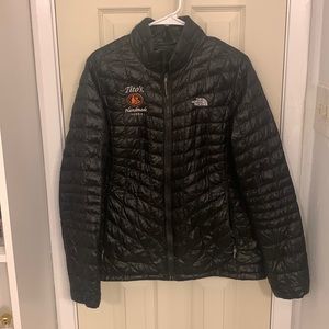 Tito’s handmade vodka Northface puffer jacket.